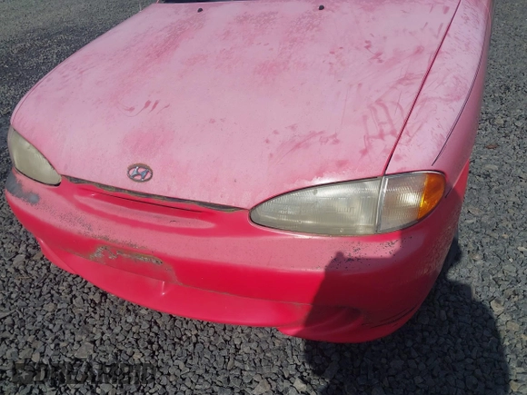 1995 Hyundai Accent z VIN KMHVD14N9SU047038, wystawiony jako IAAI lot #41895712 z przebiegiem 186 094 mil mil oraz . Historia ofert i sprzedaży dostępna na DreamBid. Obrazek 6.