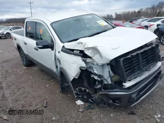 2017 Nissan Titan SL z VIN 1N6AA1E57HN524639, wystawiony jako IAAI lot #41730223 z przebiegiem 112 717 mil mil oraz . Historia ofert i sprzedaży dostępna na DreamBid. Obrazek 1.