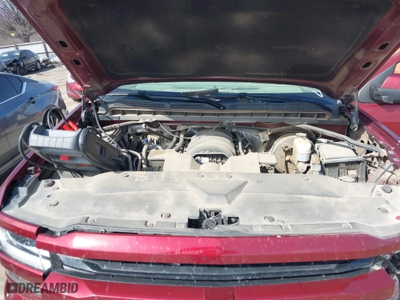 2016 Chevrolet Silverado 1500 LT with VIN 3GCUKREC0GG354271, listed as a IAAI auction lot 38948207 with 130,369 mi miles. Bid and sale history available at carsss.com. Image 10.