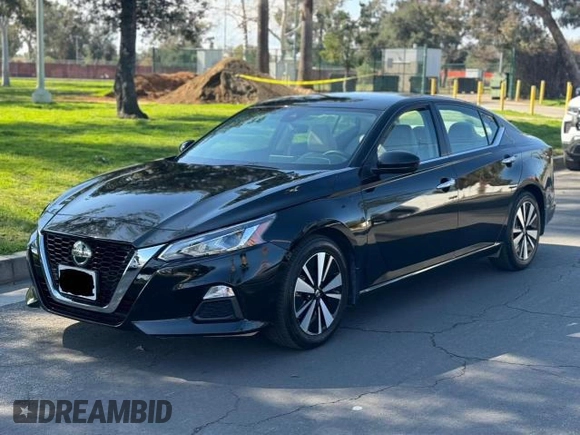 2022 Nissan Altima 2.5 SV with VIN 1N4BL4DV4NN340314, listed as a Copart auction lot 54802145 with 57,508 mi miles and Clean Title. Bid and sale history available at carsss.com. Image 2.