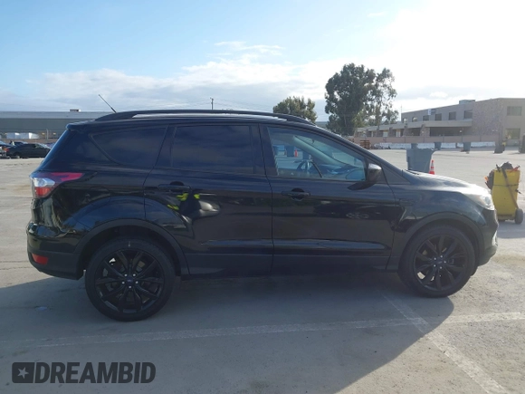 2017 Ford Escape SE with VIN 1FMCU0GDXHUC95845, listed as a IAAI auction lot 41850265 with 77,691 mi miles and . Bid and sale history available at carsss.com. Image 13.