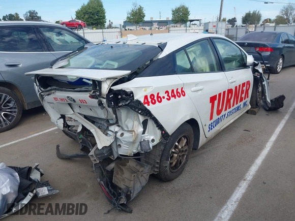 2022 Toyota Prius L Eco with VIN JTDKAMFU8N3153691, listed as a IAAI auction lot 42001298 with 190,268 mi miles and . Bid and sale history available at DreamBid. Image 4.
