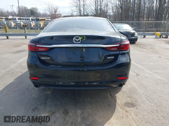 2018 Mazda 6 Touring with VIN JM1GL1VM2J1313375, listed as a IAAI auction lot 41848648 with 93,717 mi miles and . Bid and sale history available at DreamBid. Image 17.