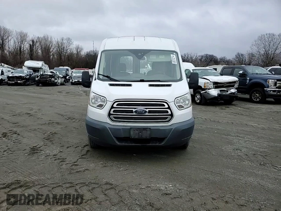 2015 Ford Transit Cargo with VIN 1FTYE1CM7FKA24477, listed as a Copart auction lot 86310214 with 54,098 mi miles and Salvage title. Bid and sale history available at DreamBid. Image 14.