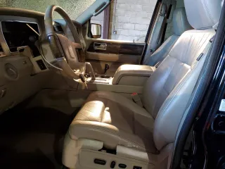 2009 Lincoln Navigator with VIN 5LMFU28569EJ01398, listed as a Copart auction lot 41881275 with 129,920 mi miles and Salvage Title. Bid and sale history available at carsss.com. Image 7.