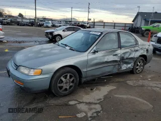1994 Honda Accord EX with VIN JHMCD5657RC010794, listed as a Copart auction lot 84705444 with 153,617 mi miles and Salvage Title. Bid and sale history available at carsss.com. Image 1.