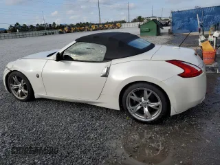 2010 Nissan 370Z Touring с VIN JN1AZ4FH2AM302093, выставлен на аукционе Copart как лот 86953624 с пробегом 138 845 миль миль и Списание • Salvage title. История ставок и продаж доступна на DreamBid. Изображение 2.