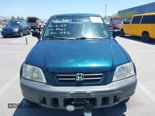 1998 Honda CR-V LX z VIN JHLRD1843WC083751, wystawiony jako IAAI lot #42356438 z przebiegiem 167 342 mil mil oraz . Historia ofert i sprzedaży dostępna na DreamBid. Obrazek 12.