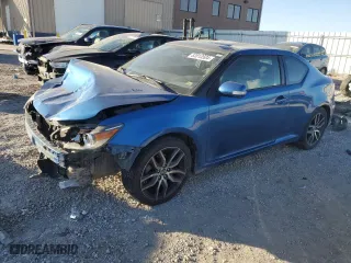2015 Scion tC with VIN JTKJF5C72FJ012056, listed as a Copart auction lot 83813504 with 131,014 mi miles and Salvage Title. Bid and sale history available at carsss.com. Image 1.