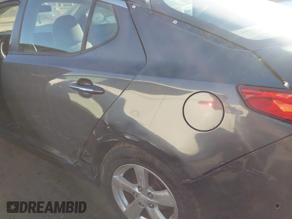 2015 Kia Optima LX with VIN KNAGM4A76F5624013, listed as a IAAI auction lot 41887296 with 224,720 mi miles. Bid and sale history available at carsss.com. Image 6.