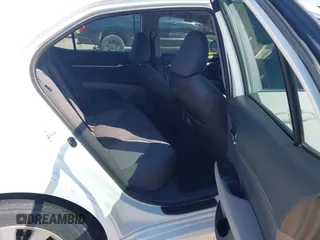 2019 Toyota Camry LE with VIN 4T1B11HK9KU825107, listed as a IAAI auction lot 41971159 with 15,802 mi miles and . Bid and sale history available at DreamBid. Image 8.