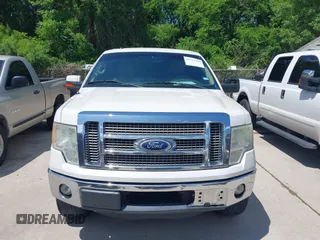 2011 Ford F-150 XLT with VIN 1FTFW1CT7BFA59275, listed as a IAAI auction lot 42111709 with 203,718 mi miles. Bid and sale history available at carsss.com. Image 6.