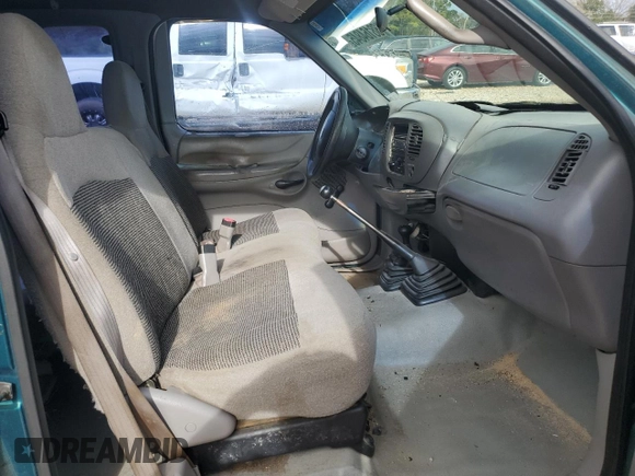 1997 Ford F-150 XL with VIN 1FTDX1869VKB05501, listed as a Copart auction lot 88164845 with 146,840 mi miles and Salvage Title. Bid and sale history available at carsss.com. Image 7.