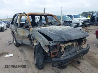 2002 Ford Explorer Sport Value z VIN 1FMYU60E02UB37971, wystawiony jako IAAI lot #41936153 z przebiegiem Nie podano mil oraz . Historia ofert i sprzedaży dostępna na DreamBid. Obrazek 1.