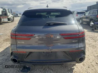 2023 Genesis GV70 2.5T with VIN KMUMADTB9PU100827, listed as a Copart auction lot 51080985 with 17,819 mi miles and Salvage Title. Bid and sale history available at carsss.com. Image 6.