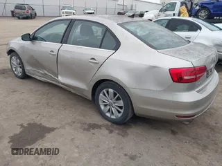 2015 Volkswagen Jetta Sedan 1.8T SE w/Connectivity with VIN 3VWD07AJ9FM326125, listed as a IAAI auction lot 41531163 with 141,284 mi miles. Bid and sale history available at carsss.com. Image 3.