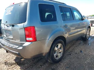 2009 Honda Pilot EX-L with VIN 5FNYF48539B035820, listed as a IAAI auction lot 41942149 with 242,463 mi miles. Bid and sale history available at carsss.com. Image 4.