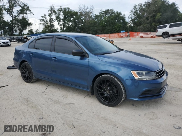 2015 Volkswagen Jetta SE with VIN 3VWD17AJ4FM308841, listed as a Copart auction lot 63437565 with 156,974 mi miles and Salvage title. Bid and sale history available at DreamBid. Image 4.