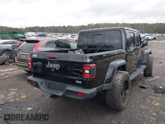 2022 Jeep Gladiator High Altitude z VIN 1C6HJTFG1NL164764, wystawiony jako IAAI lot #41727357 z przebiegiem 28 222 mil mil oraz . Historia ofert i sprzedaży dostępna na DreamBid. Obrazek 4.