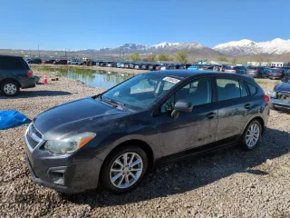 2012 Subaru Impreza Premium with VIN JF1GPAC68CH216108, listed as a Copart auction lot 53890425 with 149,860 mi miles and Salvage title. Bid and sale history available at DreamBid. Image 1.