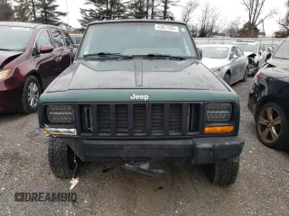 1999 Jeep Cherokee SE with VIN 1J4FF28S3XL551875, listed as a Copart auction lot 43057555 with 226,794 mi miles and Salvage title. Bid and sale history available at DreamBid. Image 5.