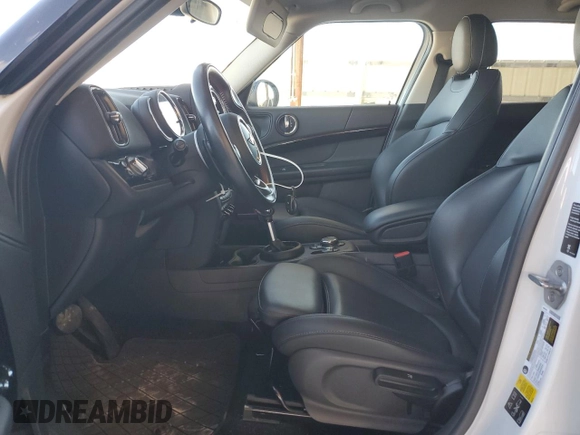 2019 MINI Countryman Cooper S with VIN WMZYT5C59K3E63967, listed as a Copart auction lot 73022644 with 56,638 mi miles and Salvage Title. Bid and sale history available at carsss.com. Image 7.