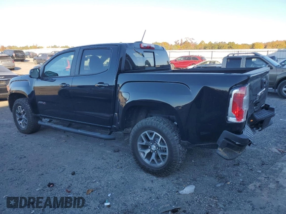 2021 GMC Canyon 4WD AT4 w/Cloth with VIN 1GTG6FEN5M1100096, listed as a Copart auction lot 77535584 with 25,152 mi miles and Salvage Title. Bid and sale history available at carsss.com. Image 2.