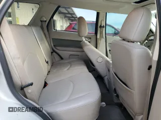 2009 Mercury Mariner Premier z VIN 4M2CU87739KJ21572, wystawiony jako Copart lot #83665504 z przebiegiem 181 858 mil mil oraz Szkoda całkowita • Salvage title. Historia ofert i sprzedaży dostępna na DreamBid. Obrazek 11.