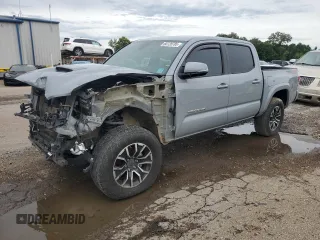 2020 Toyota Tacoma SR5 with VIN 3TMCZ5AN2LM320612, listed as a Copart auction lot 60728785 with 166,270 mi miles and Salvage title. Bid and sale history available at DreamBid. Image 1.