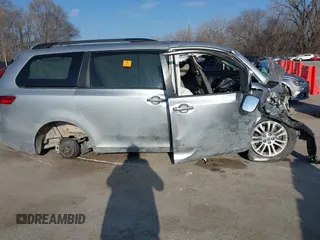 2015 Toyota Sienna XLE with VIN 5TDYK3DCXFS616362, listed as a IAAI auction lot 38882716 with Not Provided miles and . Bid and sale history available at DreamBid. Image 12.