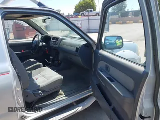 2001 Nissan Frontier SE Desert Runner z VIN 1N6ED26T51C362345, wystawiony jako IAAI lot #42324055 z przebiegiem 233 809 mil mil oraz . Historia ofert i sprzedaży dostępna na DreamBid. Obrazek 5.