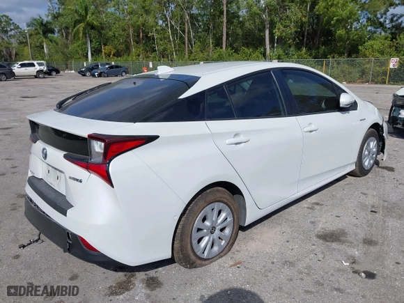 2022 Toyota Prius L Eco with VIN JTDKAMFU5N3181724, listed as a IAAI auction lot 41568635 with 67,360 mi miles. Bid and sale history available at carsss.com. Image 4.
