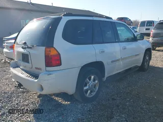 2005 GMC Envoy SLE with VIN 1GKDT13S052378542, listed as a IAAI auction lot 41897213 with 178,355 mi miles. Bid and sale history available at carsss.com. Image 4.
