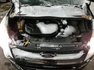 2015 Ford Escape Titanium with VIN 1FMCU0J91FUA41653, listed as a Copart auction lot 88871205 with 128,971 mi miles and Salvage Title. Bid and sale history available at DreamBid. Image 11.