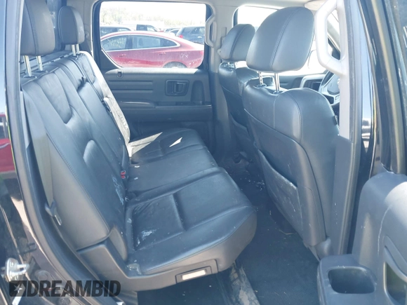 2013 Honda Ridgeline RTL with VIN 5FPYK1F57DB005538, listed as a IAAI auction lot 41985586 with 152,697 mi miles and . Bid and sale history available at DreamBid. Image 8.