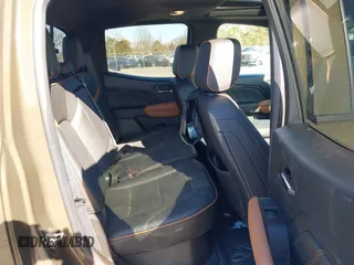 2023 GMC Canyon 4WD AT4 with VIN 1GTP6DEK1P1174713, listed as a IAAI auction lot 41733242 with 35,705 mi miles. Bid and sale history available at carsss.com. Image 8.