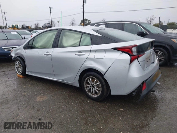 2022 Toyota Prius L Eco with VIN JTDKAMFU1N3177055, listed as a IAAI auction lot 41506862 with 121,318 mi miles and . Bid and sale history available at DreamBid. Image 3.