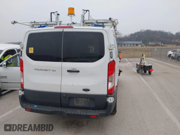2016 Ford Transit Cargo with VIN 1FTYE1ZM9GKA62074, listed as a IAAI auction lot 41550212 with 138,474 mi miles. Bid and sale history available at carsss.com. Image 16.