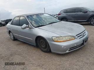 2002 Honda Accord LX z VIN JHMCG55452C002845, wystawiony jako IAAI lot #42338681 z przebiegiem Nie podano mil oraz . Historia ofert i sprzedaży dostępna na DreamBid. Obrazek 1.