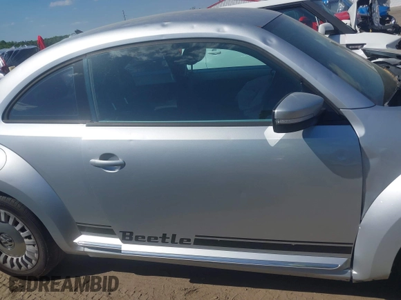 2014 Volkswagen Beetle 2.5L w/Sun with VIN 3VWJP7AT7EM633386, listed as a IAAI auction lot 42060290 with 273,374 mi miles and . Bid and sale history available at DreamBid. Image 14.
