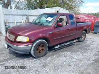 2003 Ford F-150 XL with VIN 1FTRX17203KA95359, listed as a IAAI auction lot 41891118 with 206,393 mi miles. Bid and sale history available at carsss.com. Image 2.