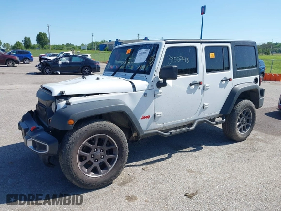 2013 Jeep Wrangler Unlimited Sport with VIN 1C4BJWDG4DL697208, listed as a IAAI auction lot 39507413 with 177,125 mi miles and . Bid and sale history available at DreamBid. Image 2.