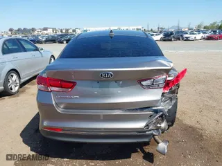 2016 Kia Optima LX with VIN 5XXGT4L39GG116566, listed as a IAAI auction lot 41949407 with 82,679 mi miles. Bid and sale history available at carsss.com. Image 17.