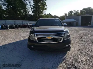 2015 Chevrolet Suburban LTZ with VIN 1GNSCKKC3FR291995, listed as a Copart auction lot 65895214 with 153,672 mi miles and Salvage Title. Bid and sale history available at carsss.com. Image 12.