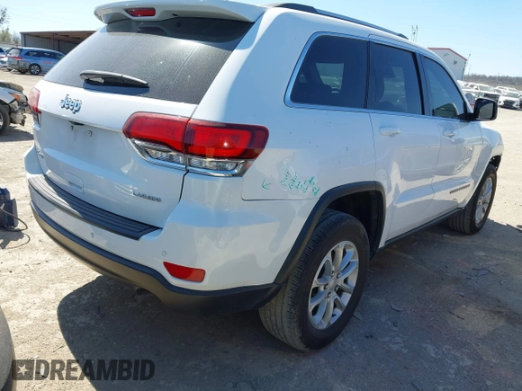 2021 Jeep Grand Cherokee Laredo E with VIN 1C4RJFAG5MC579865, listed as a IAAI auction lot 41818874 with 105,489 mi miles and . Bid and sale history available at DreamBid. Image 4.