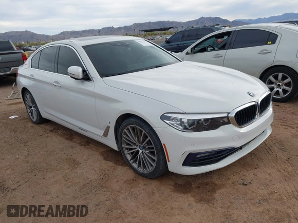 2018 BMW 5 Series 530e xDrive with VIN WBAJB1C55JB374652, listed as a IAAI auction lot 41812287 with 84,593 mi miles and . Bid and sale history available at carsss.com. Image 1.