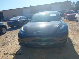 2023 Tesla Model 3 Long Range with VIN 5YJ3E1EB6PF634116, listed as a IAAI auction lot 41814670 with 47,801 mi miles and . Bid and sale history available at DreamBid. Image 13.