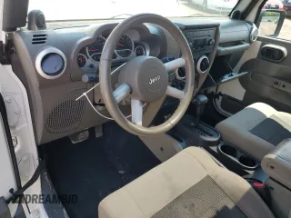 2010 Jeep Wrangler Sahara with VIN 1J4AA5D15AL167384, listed as a Copart auction lot 64210485 with 138,320 mi miles and Clean title. Bid and sale history available at DreamBid. Image 8.