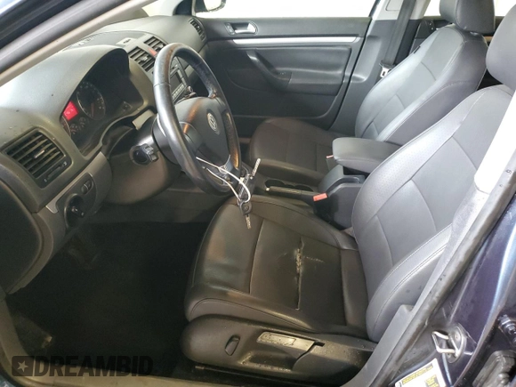 2009 Volkswagen Jetta SE z VIN 3VWRZ71KX9M167334, wystawiony jako Copart lot #63056825 z przebiegiem 187 466 mil mil oraz Szkoda całkowita • Salvage title. Historia ofert i sprzedaży dostępna na DreamBid. Obrazek 7.
