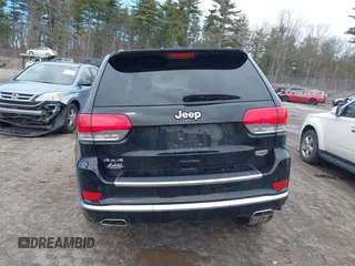 2020 Jeep Grand Cherokee Summit with VIN 1C4RJFJT5LC355247, listed as a IAAI auction lot 41809100 with 62,910 mi miles and . Bid and sale history available at DreamBid. Image 17.